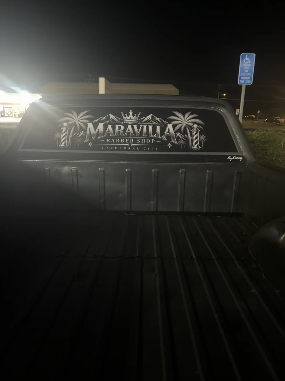 Real photo of the Maravilla logo installed on the rear window of the shop's 1967 El Camino